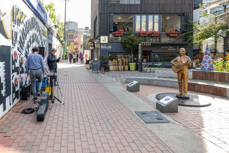 Daegu, South Korea - April 5 2019 : Tourist visit at Kim Kwang Seok Memorial Street. It is a street to commemorate the singer Kim Kwang Seok.のeditorial素材