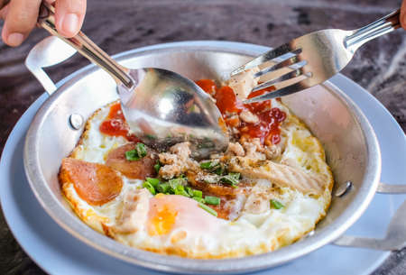 Indochina pan-fried egg with pork and toppings, Breakfast food in Thai style,vietnamese fried eggsの写真素材