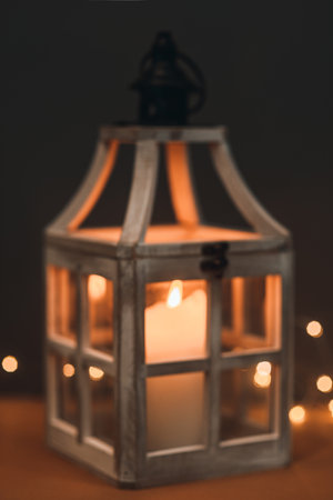 Blurred background of a flashlight with a candle, retro styleの写真素材
