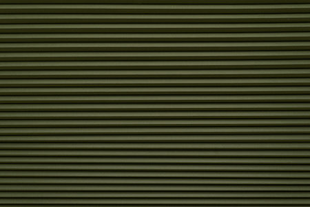 Roller blinds on the window. The texture of roller blinds. background of stripes