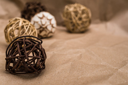 Decorative rattan round balls, on packing paper, with a place for the inscriptionの写真素材