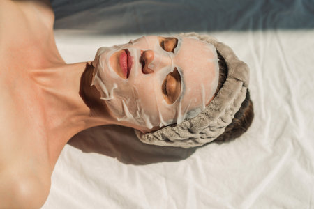 Face and body treatments. The concept of maintaining health, youth and beauty. Face masks, modern cosmetology, beautician. beauty techniques.の写真素材