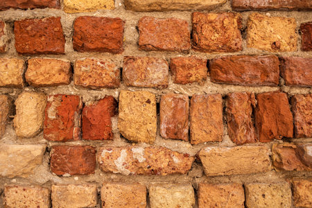 Old brick wall. Venetian Brick. old red brick wall texture background. Close-up