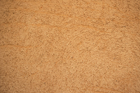 Old brown concrete wall texture background. Abstract vintage cracked spray stone rough, Cream...