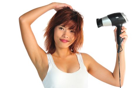 Very seductive young asian woman with hair dryerの写真素材