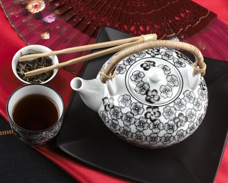 Chinese tea in a red deco atmosphereの写真素材