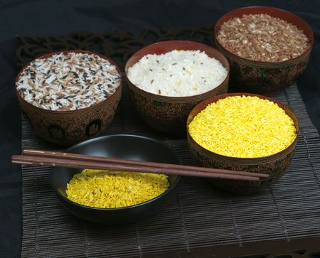 Colorful rice set detail on black backgroundの写真素材