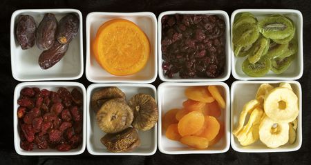 dried fruits collection on black background