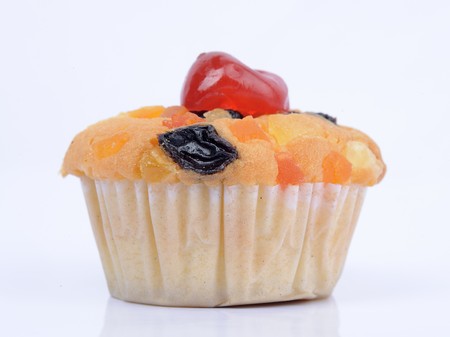 closeup of colorful muffin with cherryの写真素材
