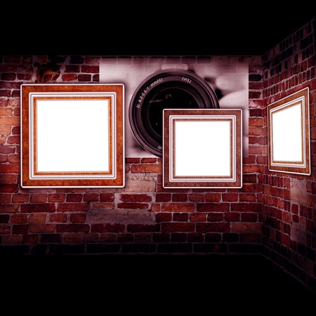 Art gallery. Frames old leather on a brickwall.
