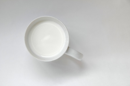 cup of milk on a light backgroundの写真素材