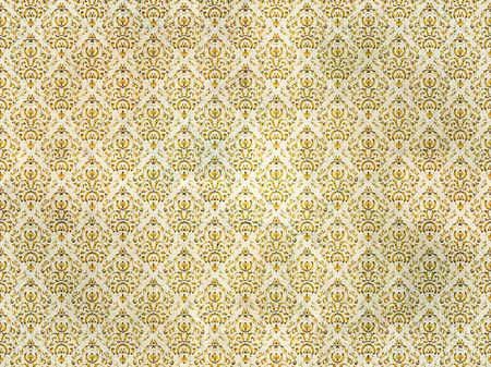 Old and distressed gold damask wallpaperの写真素材