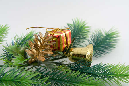 Christmas ornaments. branch, box, handbell.の写真素材