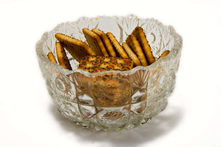 Cookies in a glass vase on a white backgroundの写真素材