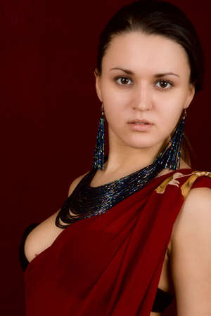 Portrait of the young sexual girl on a dark backgroundの写真素材