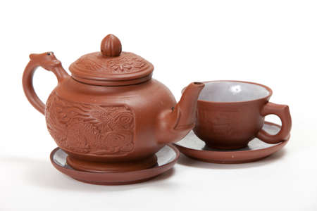 Teapot and mug on a white background. isolated imageの写真素材