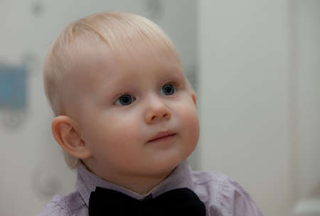 small child with bow tie. little babyの写真素材