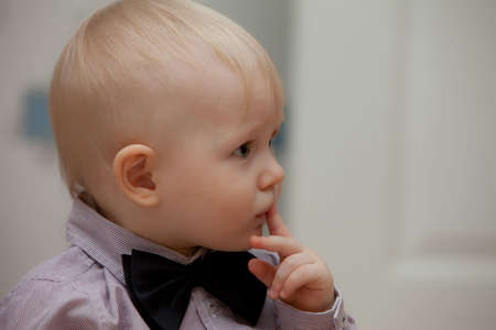 small child with bow tie. little babyの写真素材