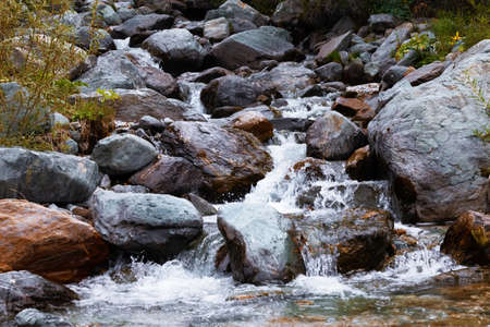 mountain river. fast stream water. Russia Altaiの写真素材