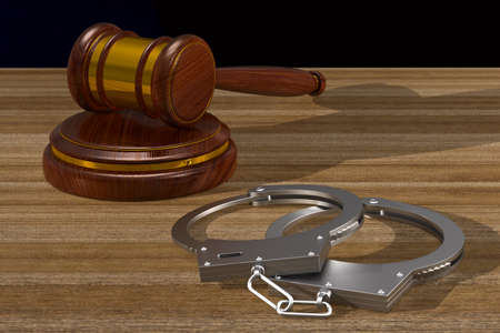 wooden gavel and handcuffs on table. 3D illustrationの写真素材