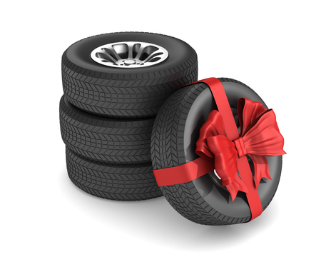 tire with red bow on white background. Isolated 3D illustrationの写真素材