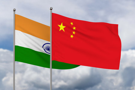 Chinese and Indian flag on sky background. 3D illustrationの写真素材