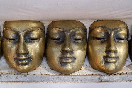 Three Bronze Face Masksの写真素材