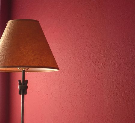 Lamp with red wallの写真素材