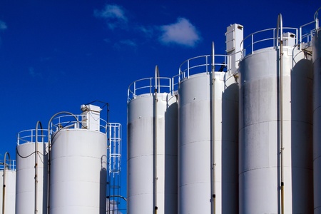 White gaz storage on the blue sky background