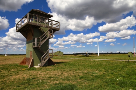 The view of the rural airport  Green grass, blue sky with clouds の写真素材