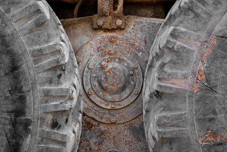 Tire rubber rubber truck, tractor, agricultural machinery, old tires, vintage, rust, metal rusty bolts and connections, wheel, wheelsの写真素材