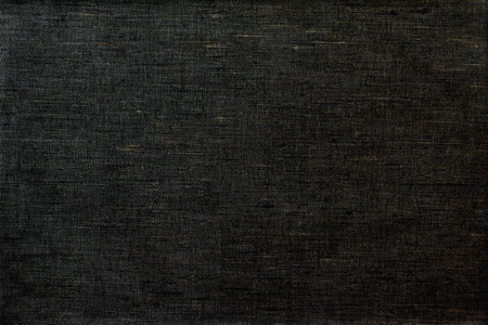 Linen homespun fabric in black color. Background.の写真素材