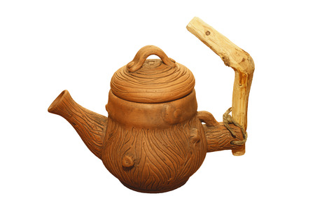 Unglazed kettle isolated on white background ..