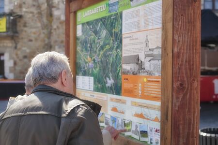 Mar. 19, 2017; Larrabetzu, Bizkaia (Basque Country). Two gentlemen in the informative panel on nature routes in the municipality of Larrabetzu.のeditorial素材
