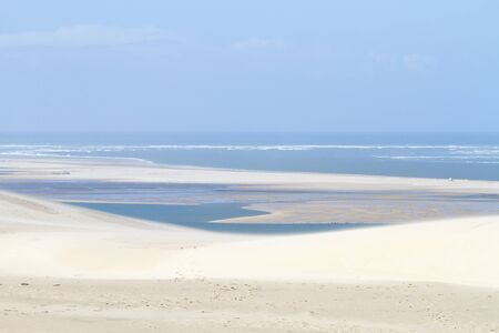 The Dune of Pilat is the tallest sand dune in Europe. It is located in La Teste-de-Buch in the Arcachon Bay area, France, 60 km from Bordeaux. With more than one million visitors per year, the Dune of Pilat is a famous tourist destination.の写真素材