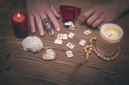 Runestone reading. Scandinavian runes divination. Future reading. の写真素材