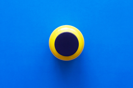 Yellow plastic jar isolated on color background.の写真素材