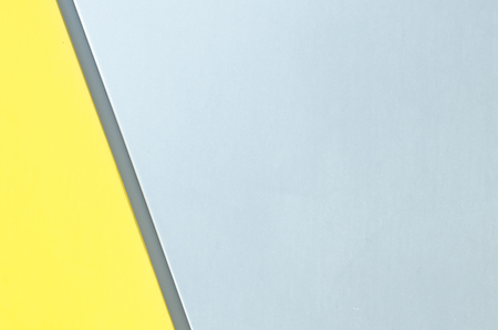 Metal splitted by a line gray yellow color background of modern siding house wall.の写真素材