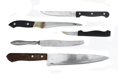 Old kitchen knife collection set isolated on a white background.の写真素材