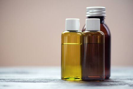 Aromatherapy oil in a bottles on the table.