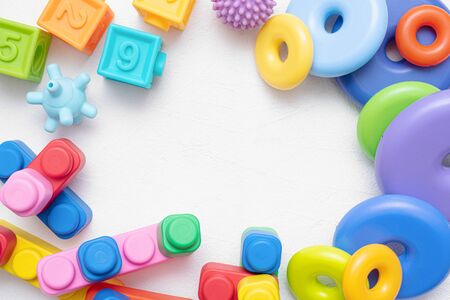 Baby toys flat lay background with copy space.