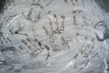 Palm print on the white flour flat lay abstract background.の写真素材