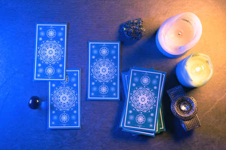 Tarot cards on stone table background. Future reading.の写真素材