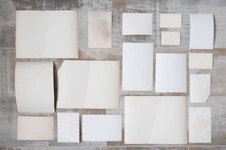 Blank paper pages with copy space for photos on the floor background.の写真素材