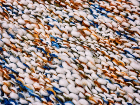 Knitted product carpet plaid close up  fiber  thread texture wool shaggy.の写真素材