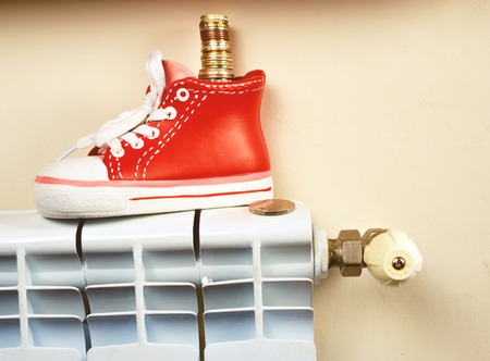 Radiator adjustment to save energy. Save energy and money concept HVACの写真素材