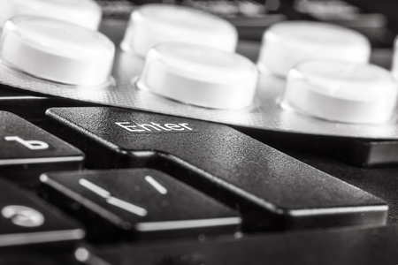 Treatment Cure of Computer analysis repair of PC Tablet in blister on keyboard Protection concept service diagnosticsの写真素材