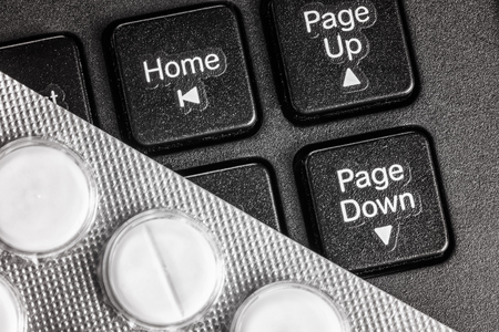 Treatment Cure of Computer analysis repair of PC Tablet in blister on keyboard Protection concept...