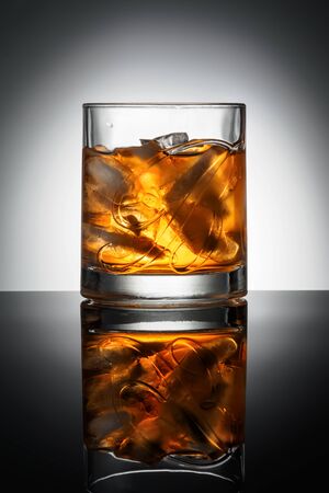 CHELYABINSK, RUSSIA - April 10,2018 Glass of Finest Blended Scotch Whiskey Ballantines Logo Delicious Scotch Whisky Ballantines is produced in Dambarton, Scotland by Pernod Ricard Editorial Photoのeditorial素材
