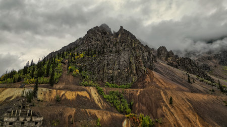 Tall Mountain Covered in Trees near Sunnyside Mill foundation & ruins in Eureka, Coloradoの写真素材